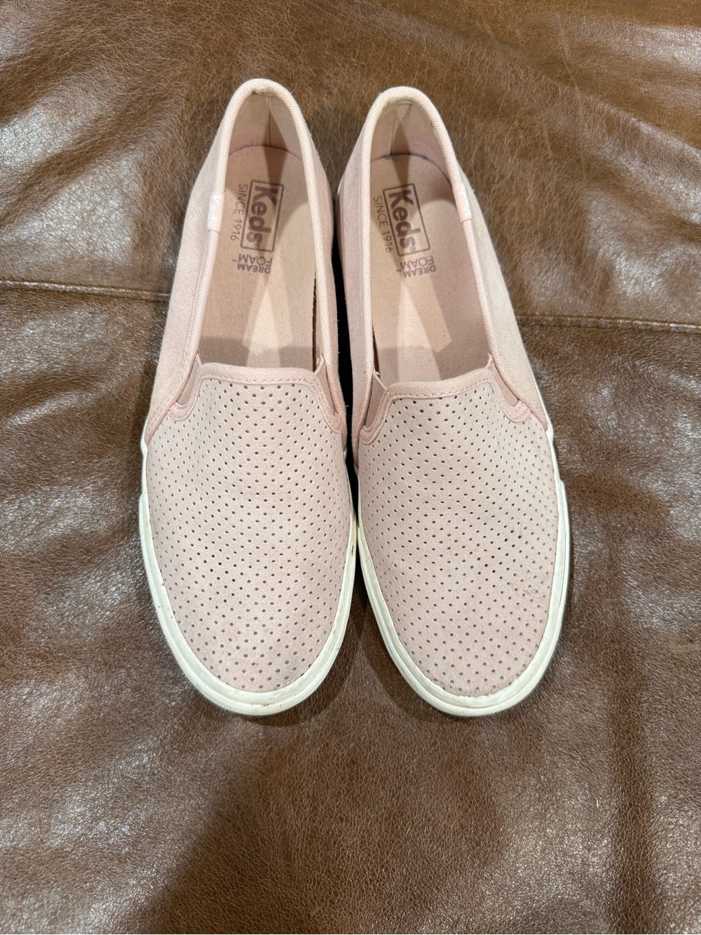 Keds Slip-On Perforated Sneakers in Blush Pink and White Sole